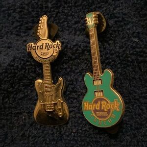 2 Hard Rock pins.